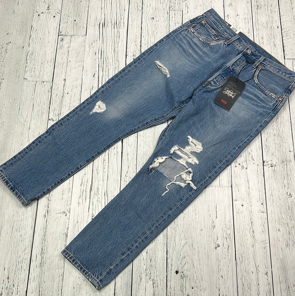 Levi’s distressed blue jeans - Hers L/32/28