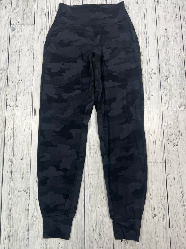 lululemon black camo patterned pants - Hers S/4