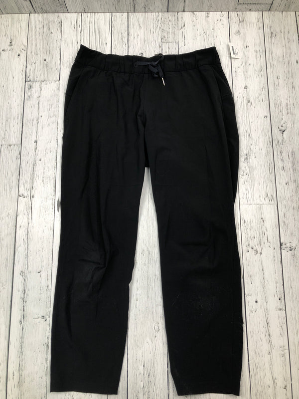 lululemon black track pants- Hers L/10