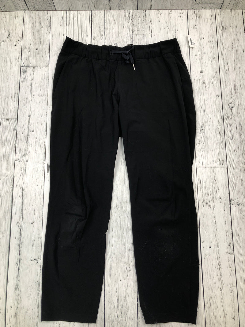 lululemon black track pants- Hers L/10
