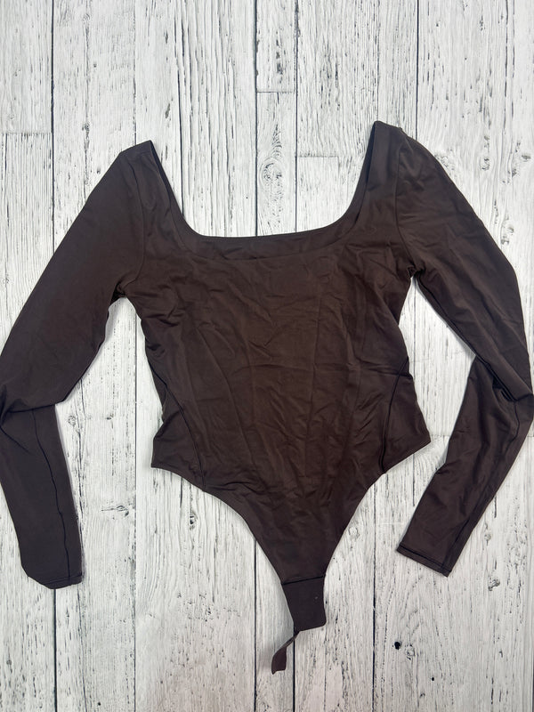 Lululemon brown body suit - Hers M