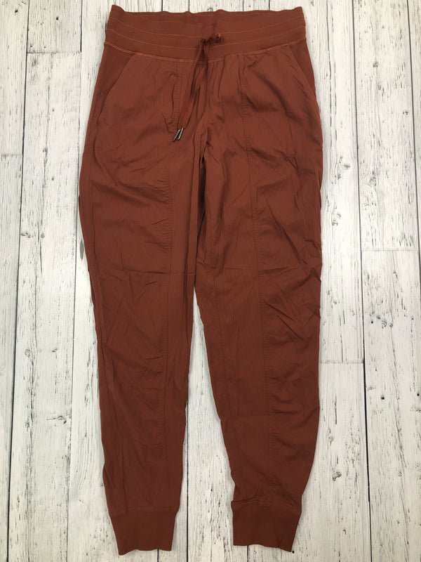 lululemon orange loggers - Hers S/6