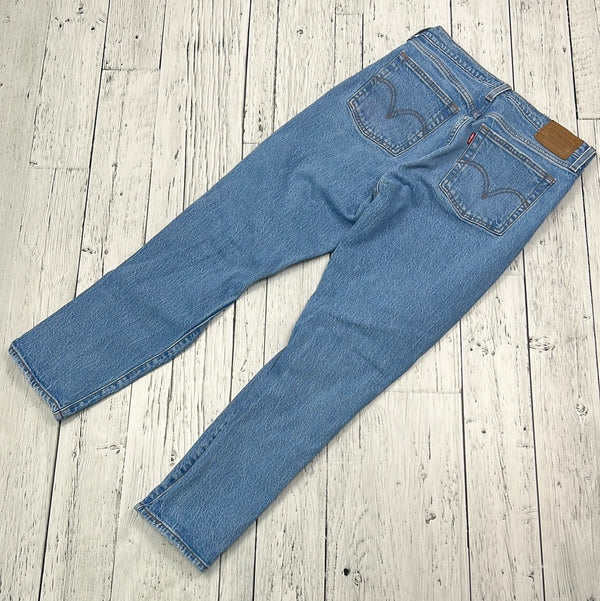 Levi’s distressed blue jeans - Hers M/28